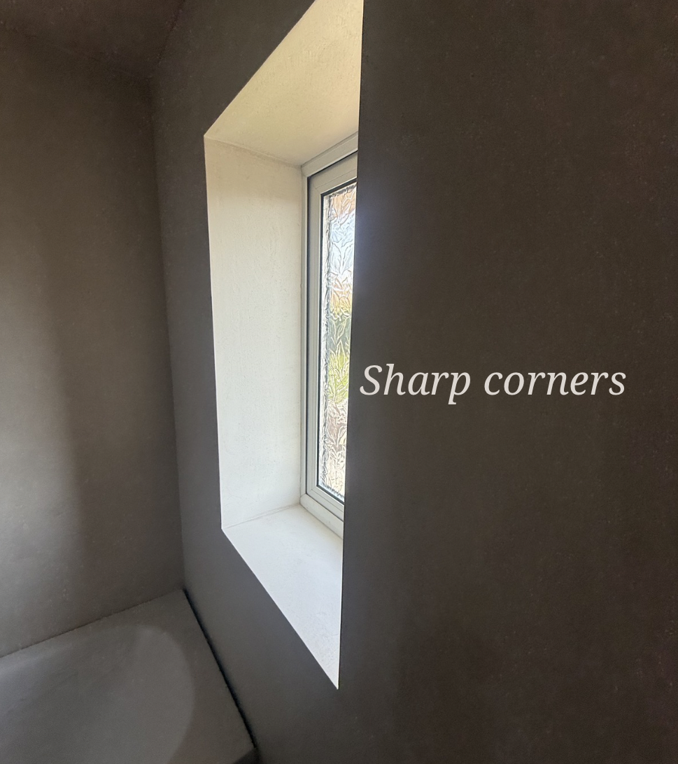 Sharp-Cornered Microcement Bathroom
